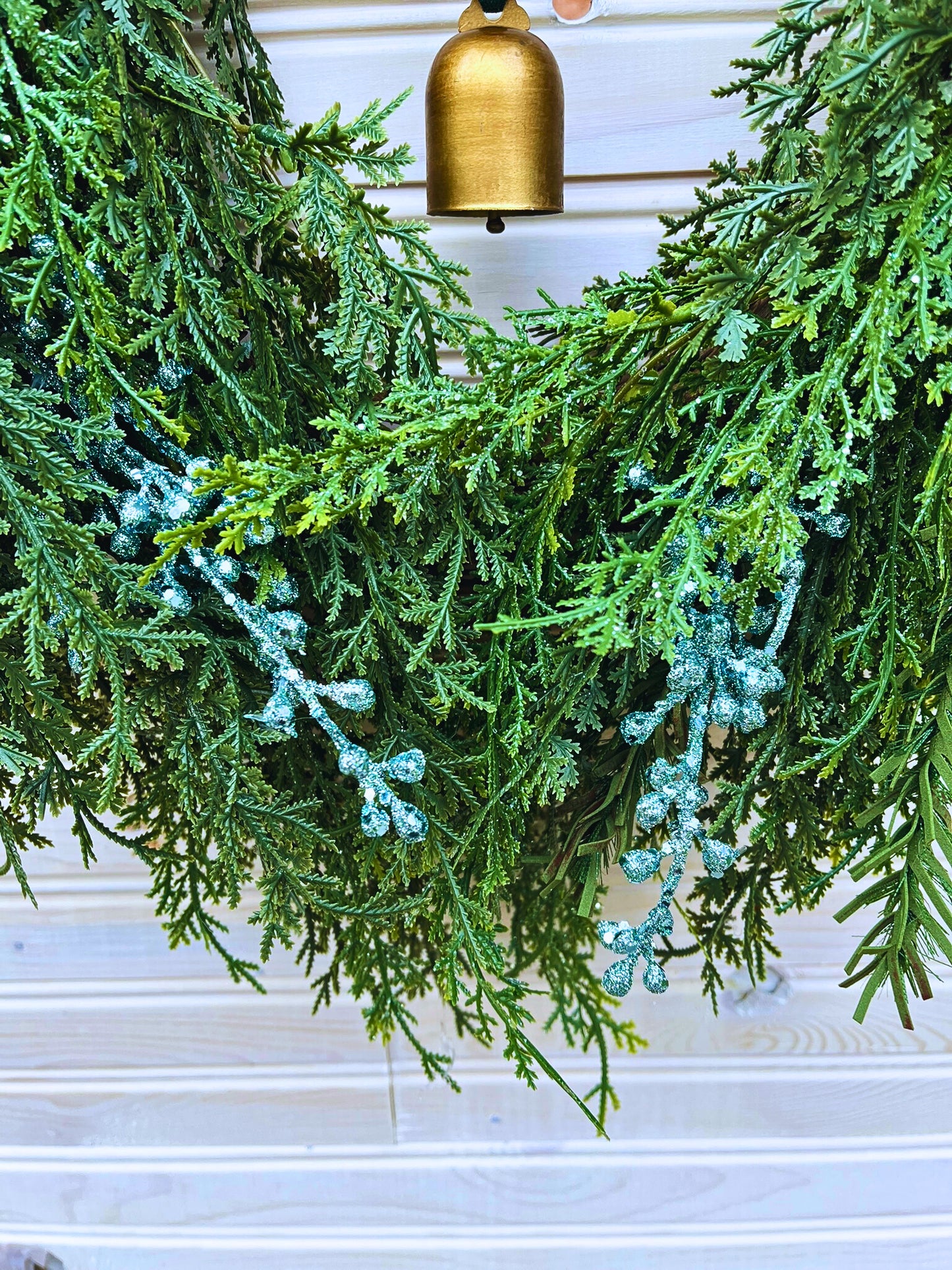 Elegant Evergreen Christmas Wreath with Bell Accent and Winter Ribbon