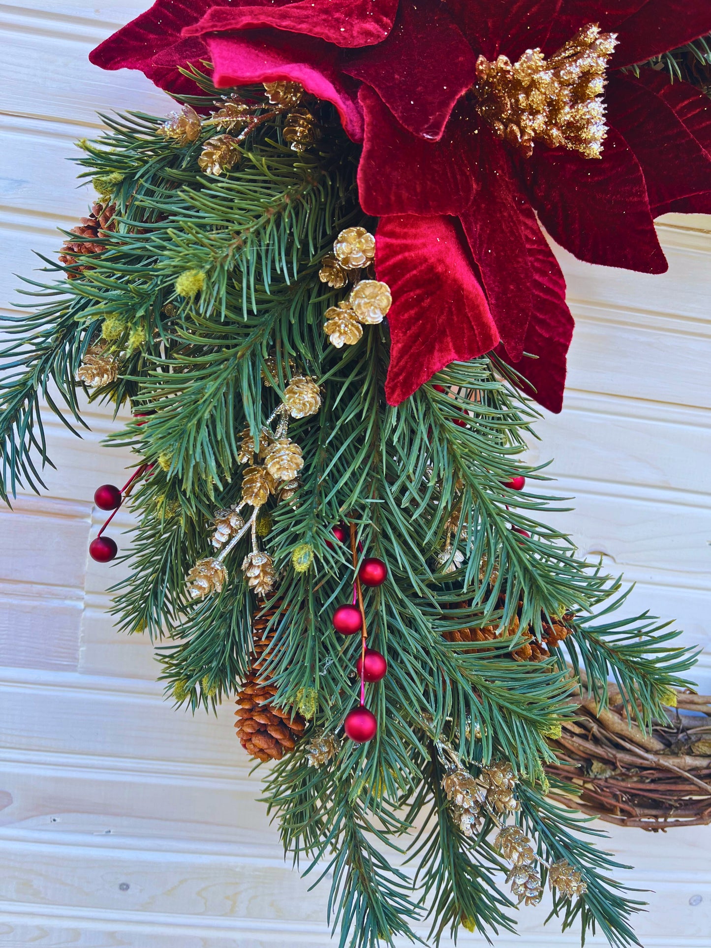 Festive Pine & Red Velvet Poinsettia Grapevine Wreath